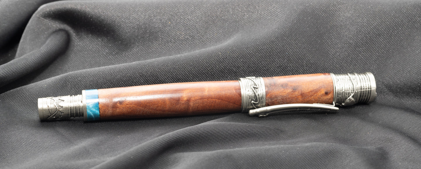 Antique Pewter Flyfishing Rollerball pen with Redwood burl and blue, curly cottonwood accent ring