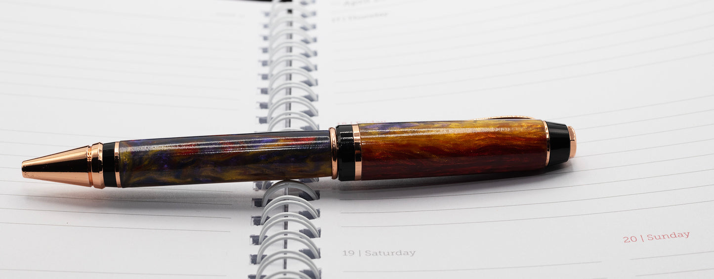Copper Cigar ballpoint pen with resin body featuring purple, red and yellow