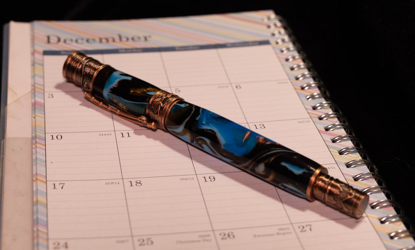 Flyfishing rollerball pen with ocean blue body